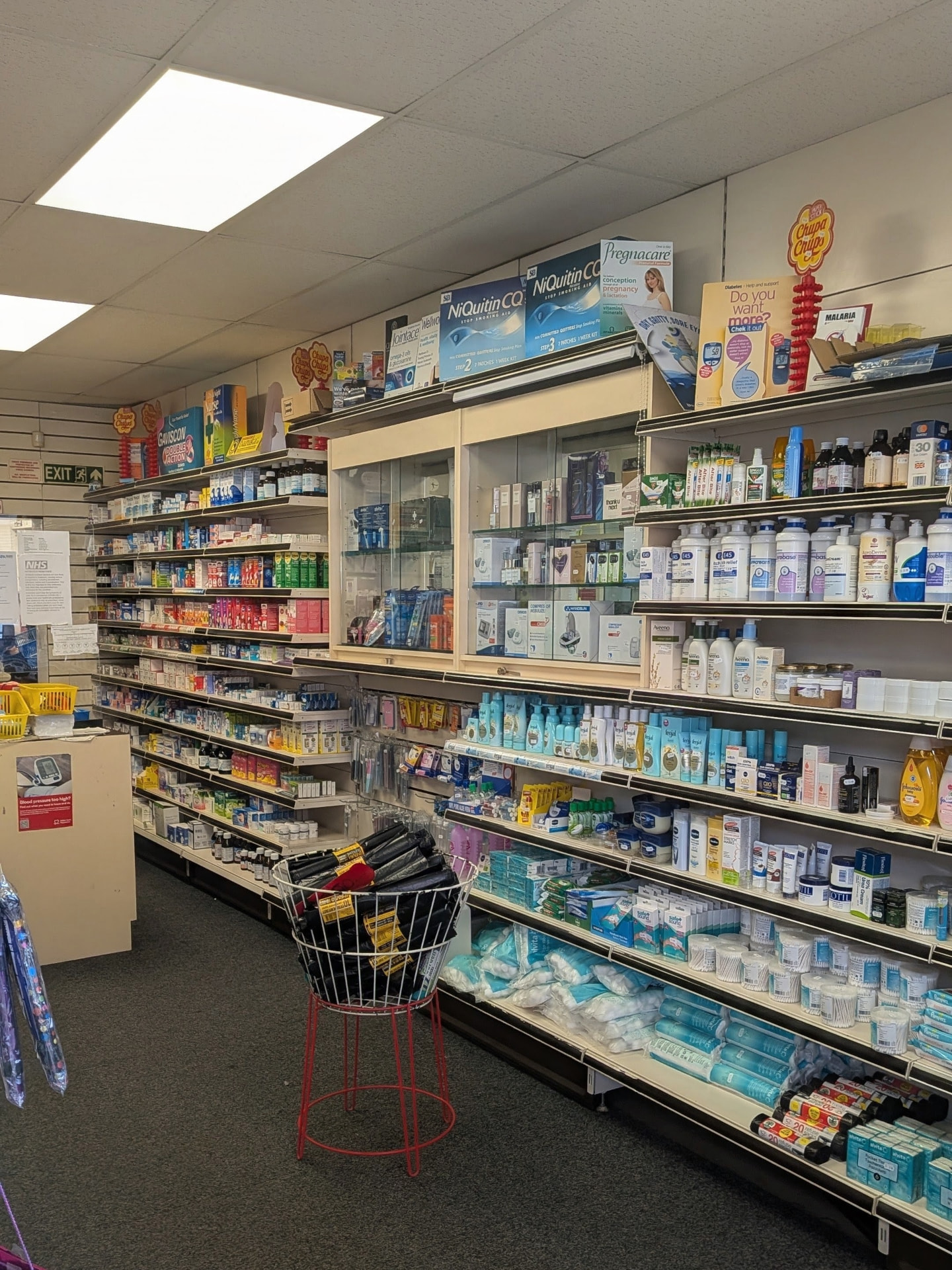 Shelves of everyday medicines and health products inside Panchem Pharmacy